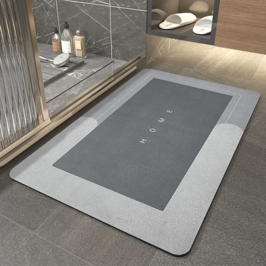  This stone shower mat has an anti-slip backing that protects it from sliding around on wet surfaces
